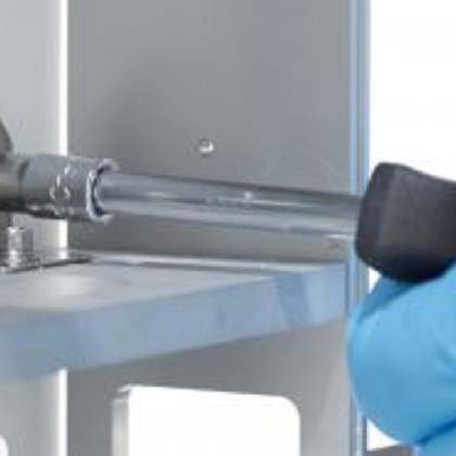 Lab technician inspecting and fixing labware