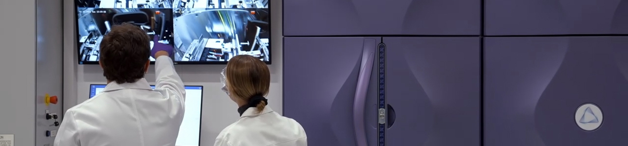 Technician inspecting screen of Azenta BioArc store