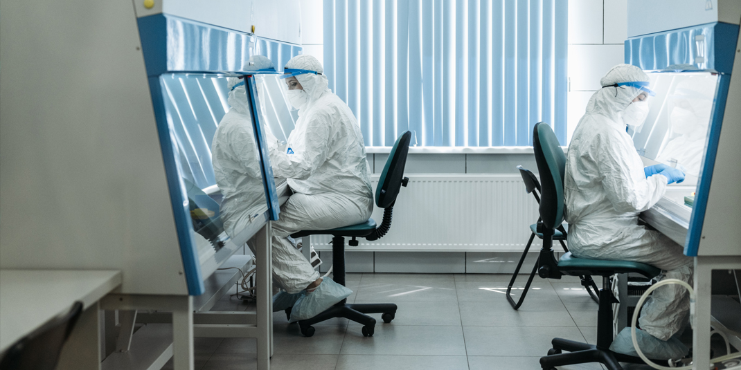 Lab personnel processing samples