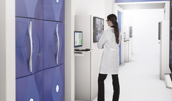 Automated Sample Storage - Lab Tech Inspecting Screen